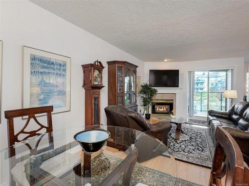 212-898 Vernon Ave, Saanich, BC - Indoor Photo Showing Living Room With Fireplace