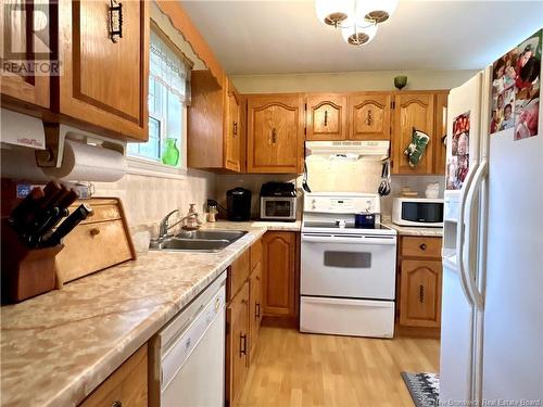 12 Forrest Street, Miramichi, NB - Indoor Photo Showing Kitchen With Double Sink