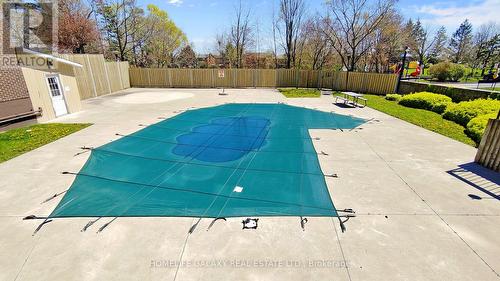 1002 - 2556 Argyle Road, Mississauga, ON - Outdoor With In Ground Pool With Backyard