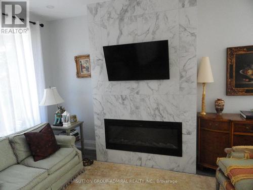 4 Treeview Drive, Toronto, ON - Indoor Photo Showing Living Room With Fireplace