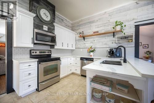 3033 Mclaughlin Road, Whitewater Region, ON - Indoor Photo Showing Kitchen With Double Sink