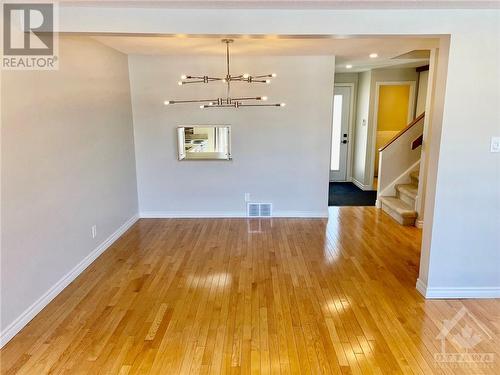 Open concept dining/living area. LIght fixture has been removed by the tenants and will be reinstalled. - 2285 Stonehenge Crescent, Ottawa, ON - Indoor Photo Showing Other Room