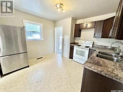 778 4Th Street E, Prince Albert, SK - Indoor Photo Showing Kitchen With Double Sink