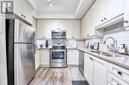 13 - 15 Heron Park, Toronto, ON - Indoor Photo Showing Kitchen With Stainless Steel Kitchen With Double Sink