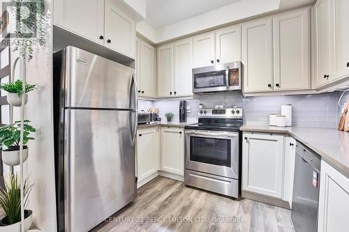 13 - 15 Heron Park, Toronto, ON - Indoor Photo Showing Kitchen With Stainless Steel Kitchen