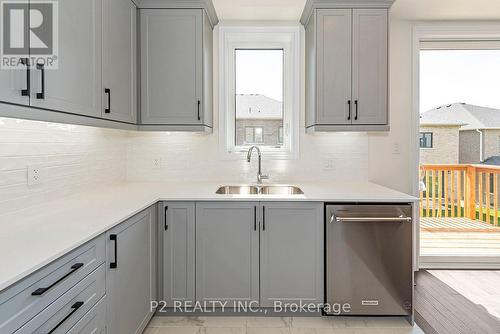 18 Wild Ginger Lane, Springwater, ON - Indoor Photo Showing Kitchen With Double Sink