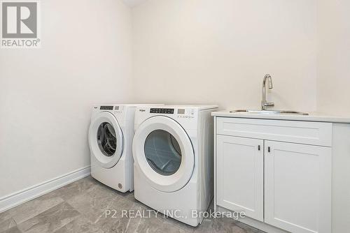 18 Wild Ginger Lane, Springwater, ON - Indoor Photo Showing Laundry Room