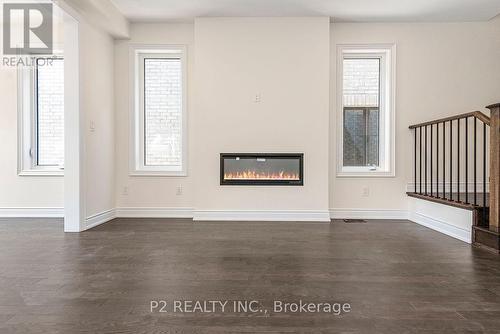 18 Wild Ginger Lane, Springwater, ON - Indoor With Fireplace