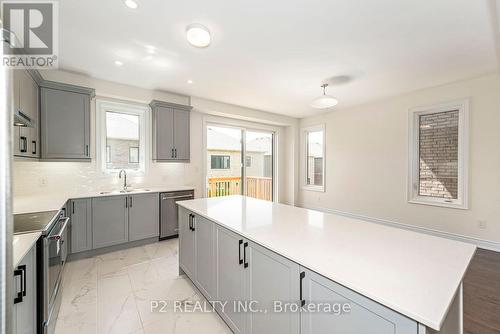 18 Wild Ginger Lane, Springwater, ON - Indoor Photo Showing Kitchen With Upgraded Kitchen