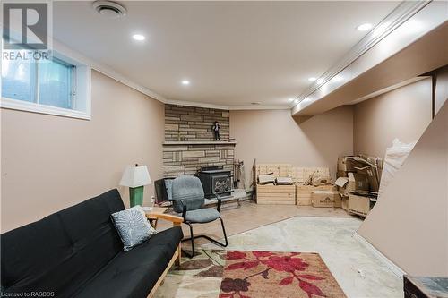 Family Room - 559146 Irish Block Road, Annan, ON - Indoor With Fireplace