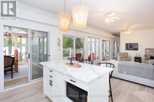 38 Dewey'S Island Road, Kawartha Lakes (Fenelon Falls), ON - Indoor Photo Showing Other Room With Fireplace