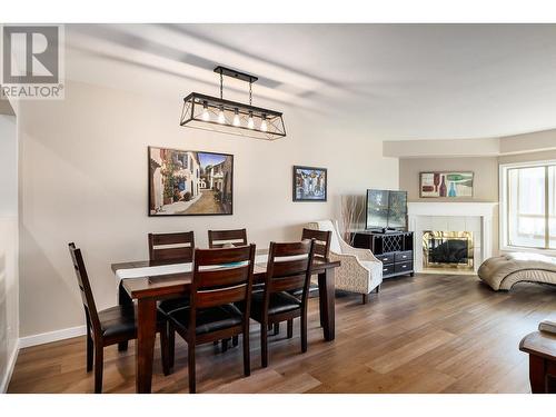 3767 Brown Road Unit# 307, West Kelowna, BC - Indoor Photo Showing Dining Room With Fireplace