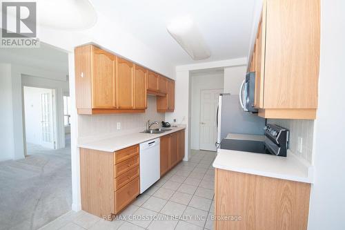 412 - 90 Dean Avenue, Barrie, ON - Indoor Photo Showing Kitchen With Double Sink