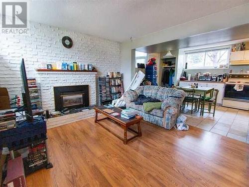 598 Ewert Street, Prince George, BC - Indoor Photo Showing Living Room With Fireplace