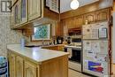 18 Lloyd Bay, Regina, SK  - Indoor Photo Showing Kitchen With Double Sink 