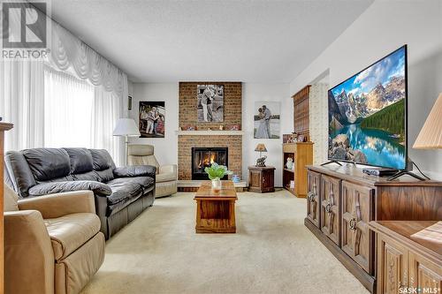 18 Lloyd Bay, Regina, SK - Indoor Photo Showing Living Room With Fireplace