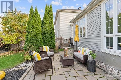 Inviting outdoor living space with a spacious patio area, ideal for entertaining guests and enjoying outdoor meals. - 316 Eckerson Avenue, Ottawa, ON - Outdoor With Deck Patio Veranda With Exterior