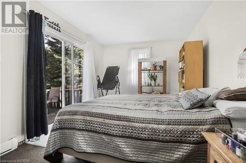 Upper Bed 1 with walk out to patio - 491 Minnesota Street, Collingwood, ON - Indoor Photo Showing Bedroom