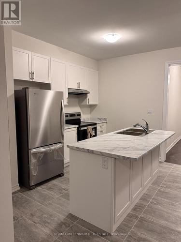 2 - 13 Bannister Road, Barrie, ON - Indoor Photo Showing Kitchen With Double Sink