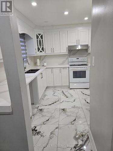 59 - 105 Hansen Road, Brampton, ON - Indoor Photo Showing Kitchen With Double Sink