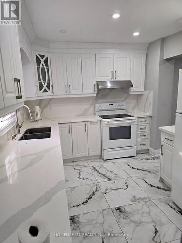 59 - 105 Hansen Road, Brampton, ON - Indoor Photo Showing Kitchen With Double Sink