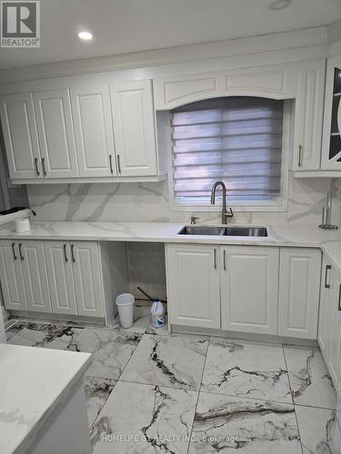 59 - 105 Hansen Road, Brampton, ON - Indoor Photo Showing Kitchen With Double Sink