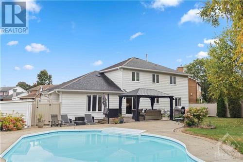 8 Spindle Way, Stittsville, ON - Outdoor With In Ground Pool With Deck Patio Veranda