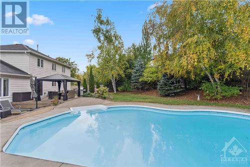 8 Spindle Way, Stittsville, ON - Outdoor With In Ground Pool With Deck Patio Veranda With Backyard