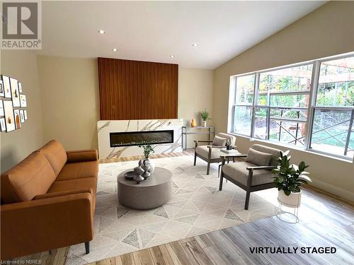 40 Masson Lane, Callander, ON - Indoor Photo Showing Living Room With Fireplace