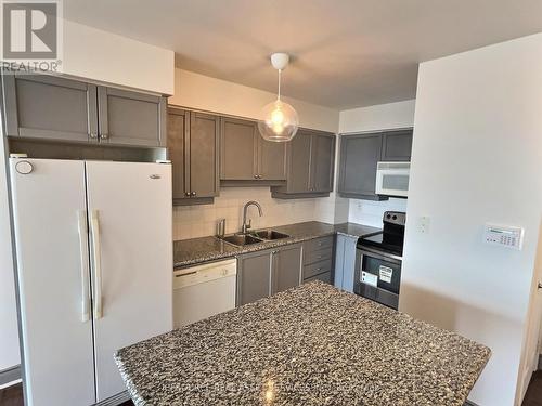 1625 - 80 Harrison Garden Boulevard, Toronto, ON - Indoor Photo Showing Kitchen With Double Sink