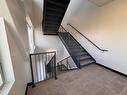 Staircase - 200-3351 Av. De La Gare, Mascouche, QC  - Indoor Photo Showing Other Room 