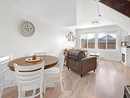 110-870 Mcqueen Drive, Kamloops, BC - Indoor Photo Showing Dining Room With Fireplace