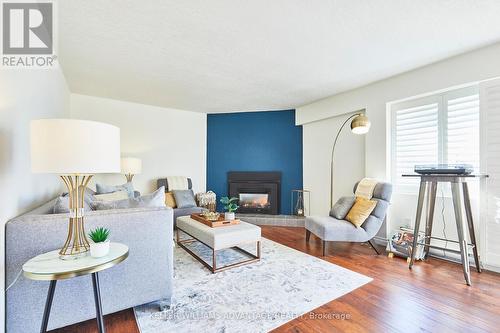 59 - 209472 Highway 26, Blue Mountains, ON - Indoor Photo Showing Living Room With Fireplace