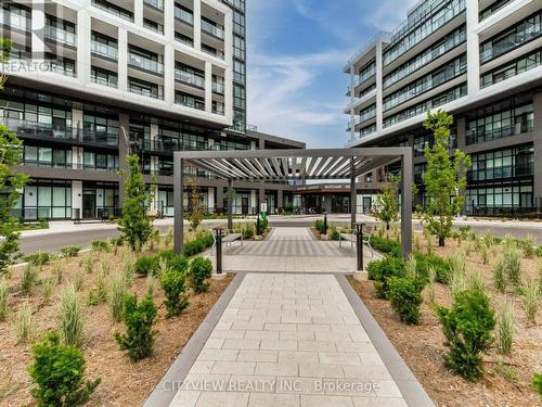 925 - 50 George Butchart Drive, Toronto, ON - Outdoor With Balcony With Facade