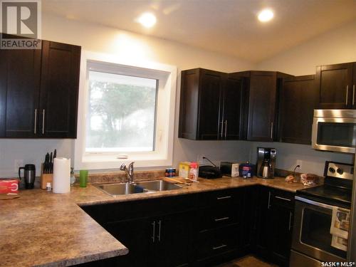 431 Centre Street, Middle Lake, SK - Indoor Photo Showing Kitchen With Double Sink