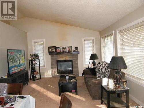 431 Centre Street, Middle Lake, SK - Indoor Photo Showing Living Room With Fireplace