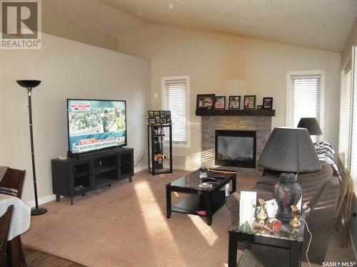 431 Centre Street, Middle Lake, SK - Indoor Photo Showing Living Room With Fireplace