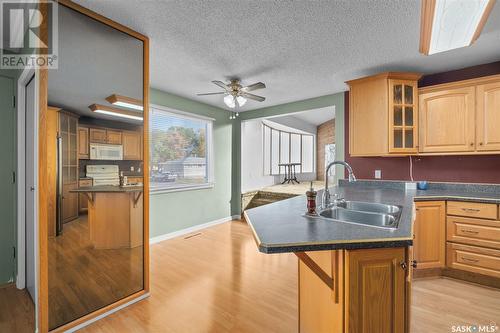 1339 6Th Street E, Prince Albert, SK - Indoor Photo Showing Kitchen With Double Sink