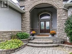 Welcoming and spacious covered front entrance. - 