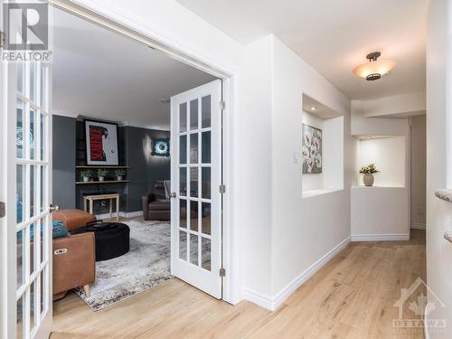 Lovely home theatre room complete with surround sound wiring.  Or set up as a guest room or a home office.  Perfect size to meet any of your needs. - 50 Frances Colbert Avenue, Ottawa, ON - Indoor Photo Showing Other Room With Fireplace