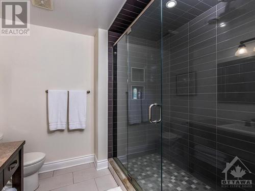 Lower level Bathroom with full size shower stall conveniently located between the 2 bedrooms for easy access for both rooms. - 50 Frances Colbert Avenue, Ottawa, ON - Indoor Photo Showing Bathroom