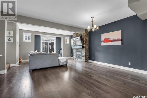 20 425 Langer Place, Warman, SK - Indoor Photo Showing Living Room With Fireplace