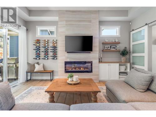 49 Forest Edge Drive, Kelowna, BC - Indoor Photo Showing Living Room With Fireplace