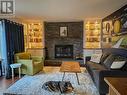 10693 Cottonwood Crescent, Dawson Creek, BC  - Indoor Photo Showing Living Room With Fireplace 