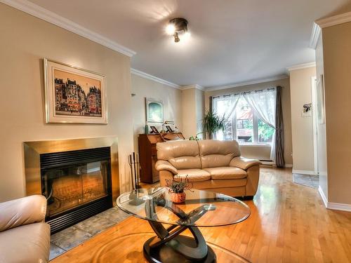 Salon - 4600 Av. Charlemagne, Montréal (Rosemont/La Petite-Patrie), QC - Indoor Photo Showing Living Room With Fireplace