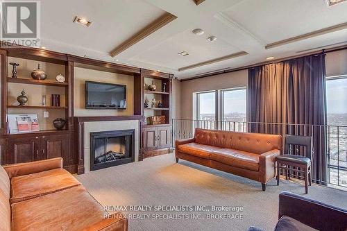 2806 - 388 Prince Of Wales Drive, Mississauga, ON - Indoor Photo Showing Living Room With Fireplace