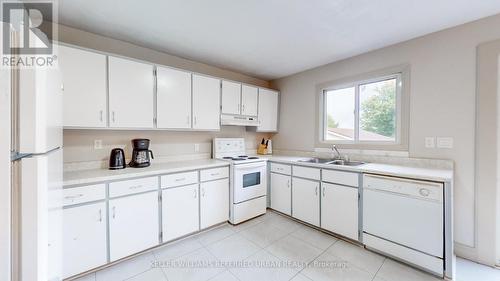 33 Shelley Drive, Kawartha Lakes, ON - Indoor Photo Showing Kitchen With Double Sink