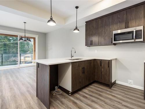 B-990 1St St, Courtenay, BC - Indoor Photo Showing Kitchen With Double Sink