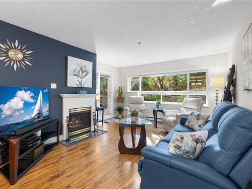 114-1685 Estevan Rd, Nanaimo, BC - Indoor Photo Showing Living Room With Fireplace