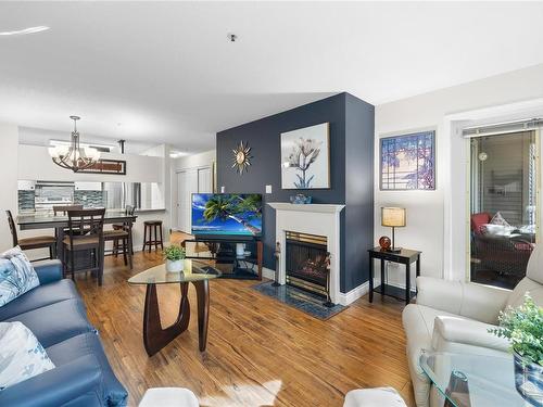 114-1685 Estevan Rd, Nanaimo, BC - Indoor Photo Showing Living Room With Fireplace